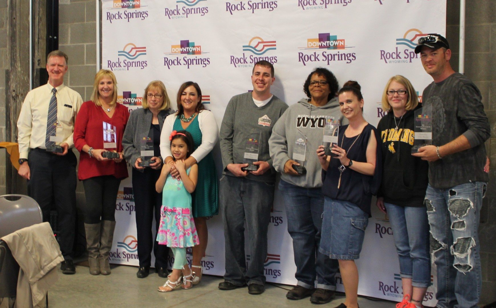 Winners (left to right) are: Ben Hansen (RSNB Bank), Jane Daniel (Daniel's Jewelry), Kathy Garrison and Wendy Isaac (Sweetwater Family Resource Center), James Nichols (Boschetto's European Market), Regina Webb, Trina Brittain, Heather and Jason Lee (Angels Antiques and Things); Photo Provided By URA