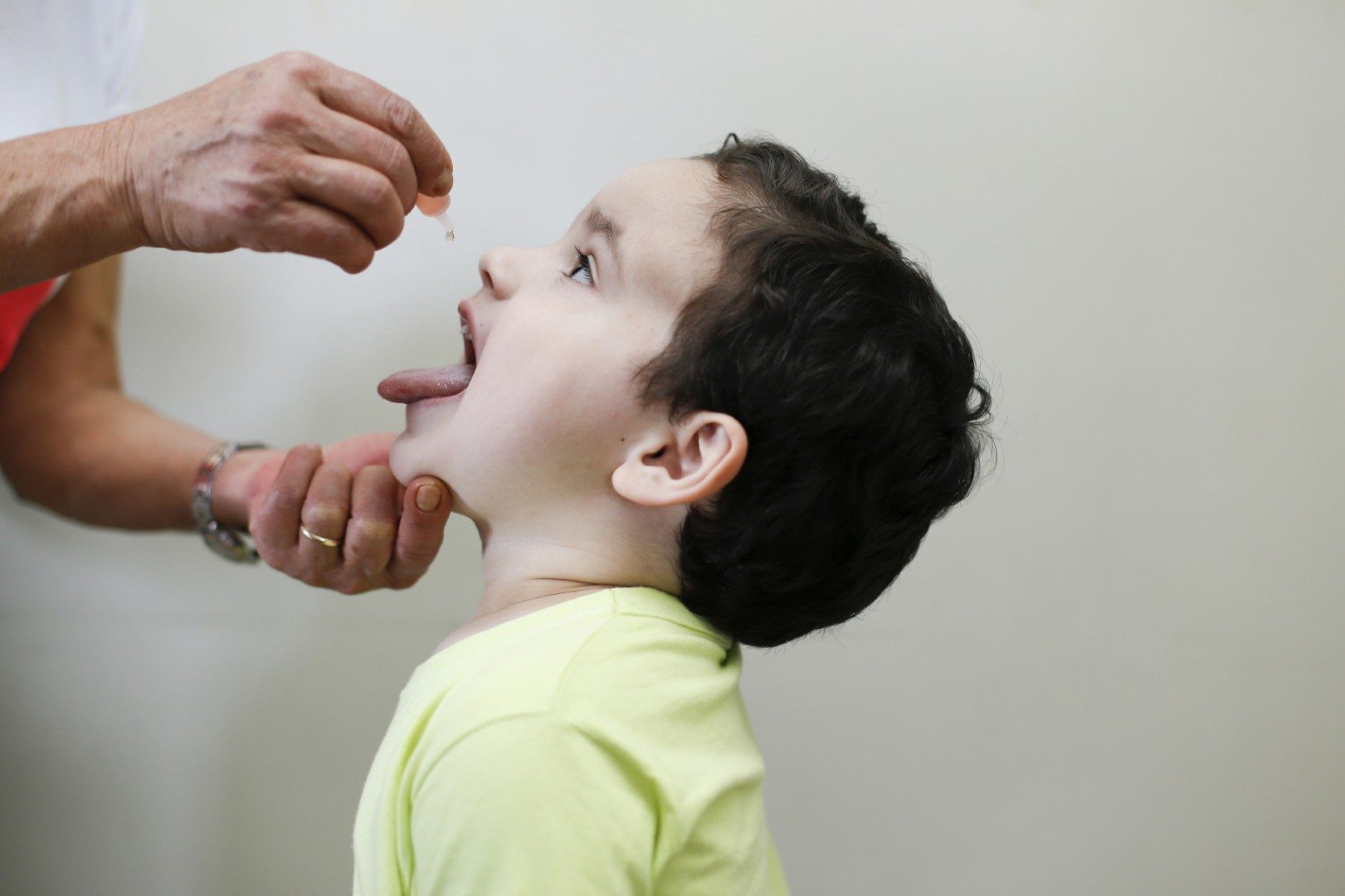 Working families without paid sick leave are twice as likely to delay or forego medical care, according to a new report. (Sidney de Almeida/iStockphoto)