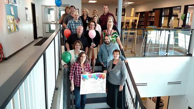  BBHS staff celebrate their 20.44% increase in graduation rate climbing to 59.46% in 15-16. Staff pictured include from upper left: Connie Zampedri, Jerry Coulson, Wanda Maloney, Stephanie Tolman, Mike Maloney, Brad Cox, Kelly McGovern, Janette VanPatten, Shayn Stillson, Sharon Seaton, Kathy Sisemore, Jeannie Coulson, Adam Gonzales, Shari Kumer, and Janelle Parton.